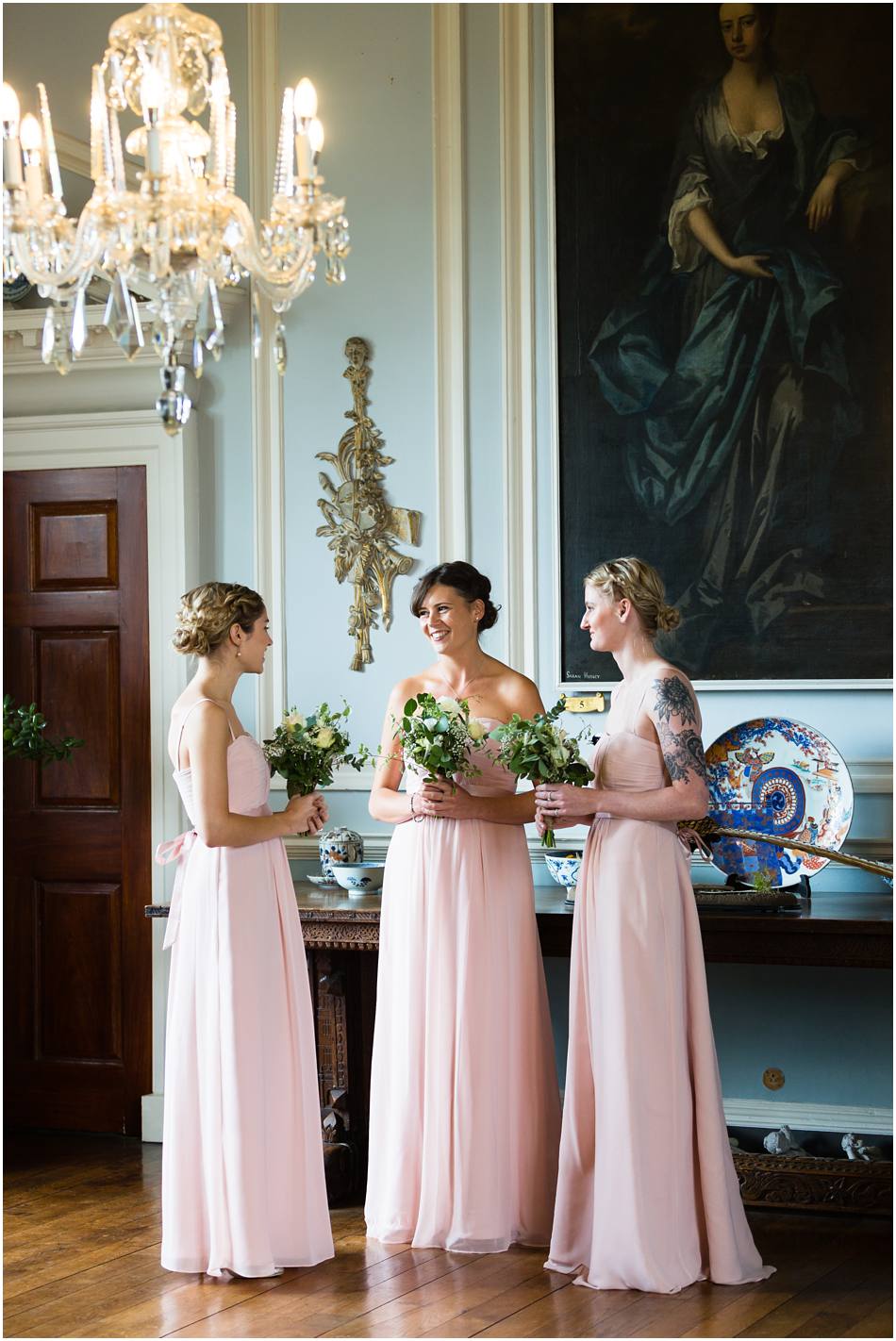 Bridesmaids waiting before the wedding ceremony at Doddington Hall