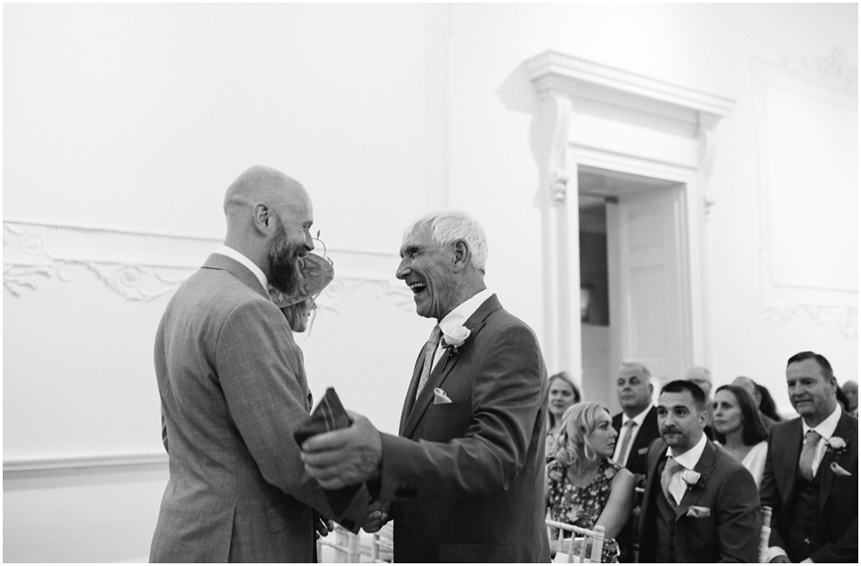 candid photo of a Groom waiting before his wedding ceremony at Compton Verney