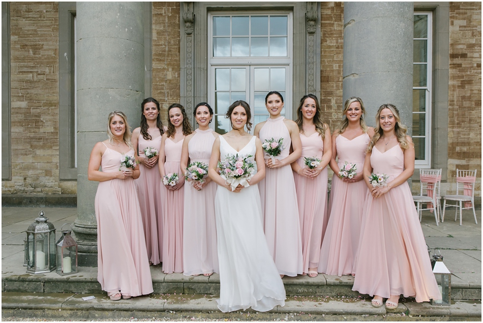 Compton Verney wedding photography; Bride and Bridesmaids wearing blush pink dresses with pastel rose bouquets