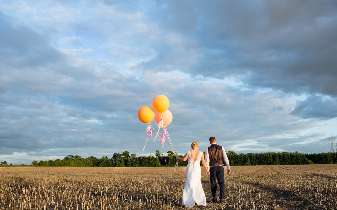 Shustoke Farm Barns Wedding with Giant Tassell Balloons