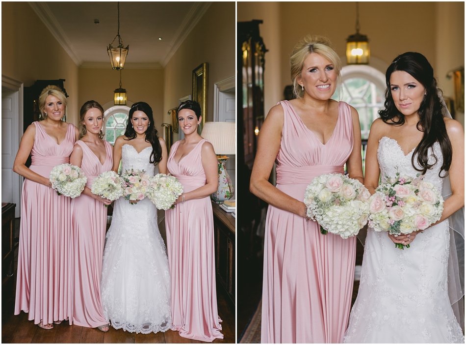glamorous wedding photography at Iscoyd Park; Bride with Bridesmaids in blush pink wrap dresses