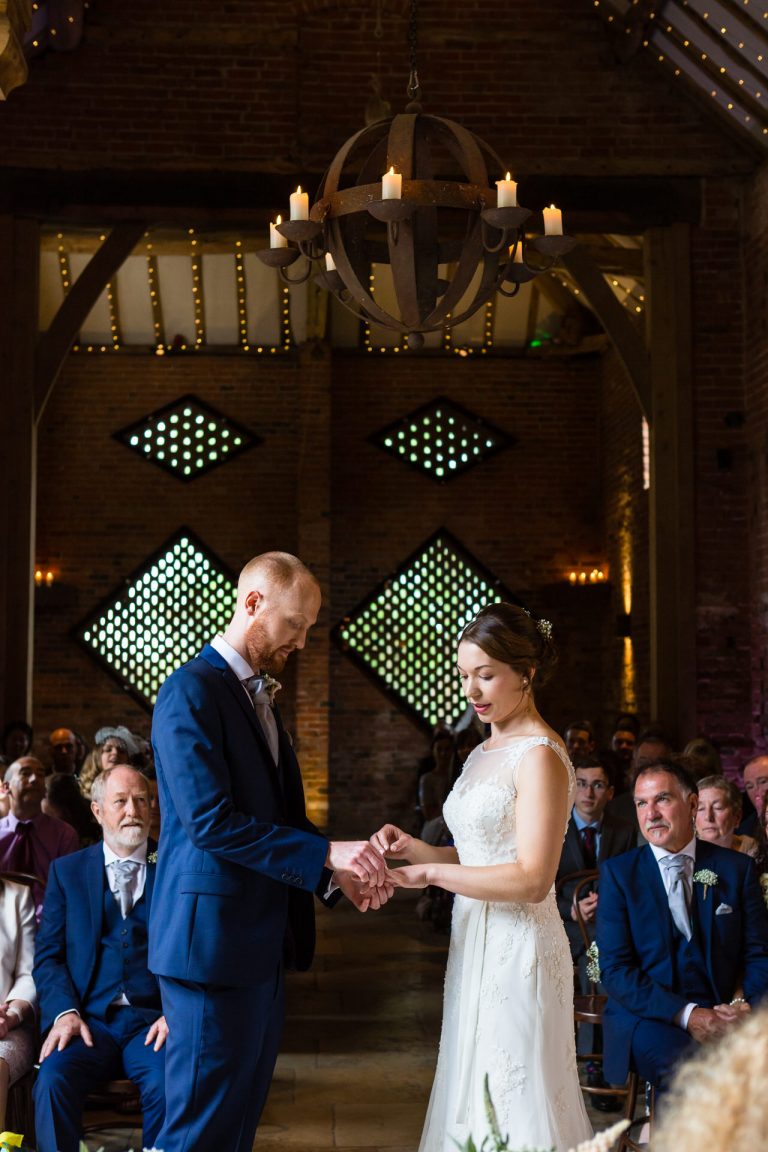 Shustoke Barn wedding photography; Bride and Groom in civil ceremony