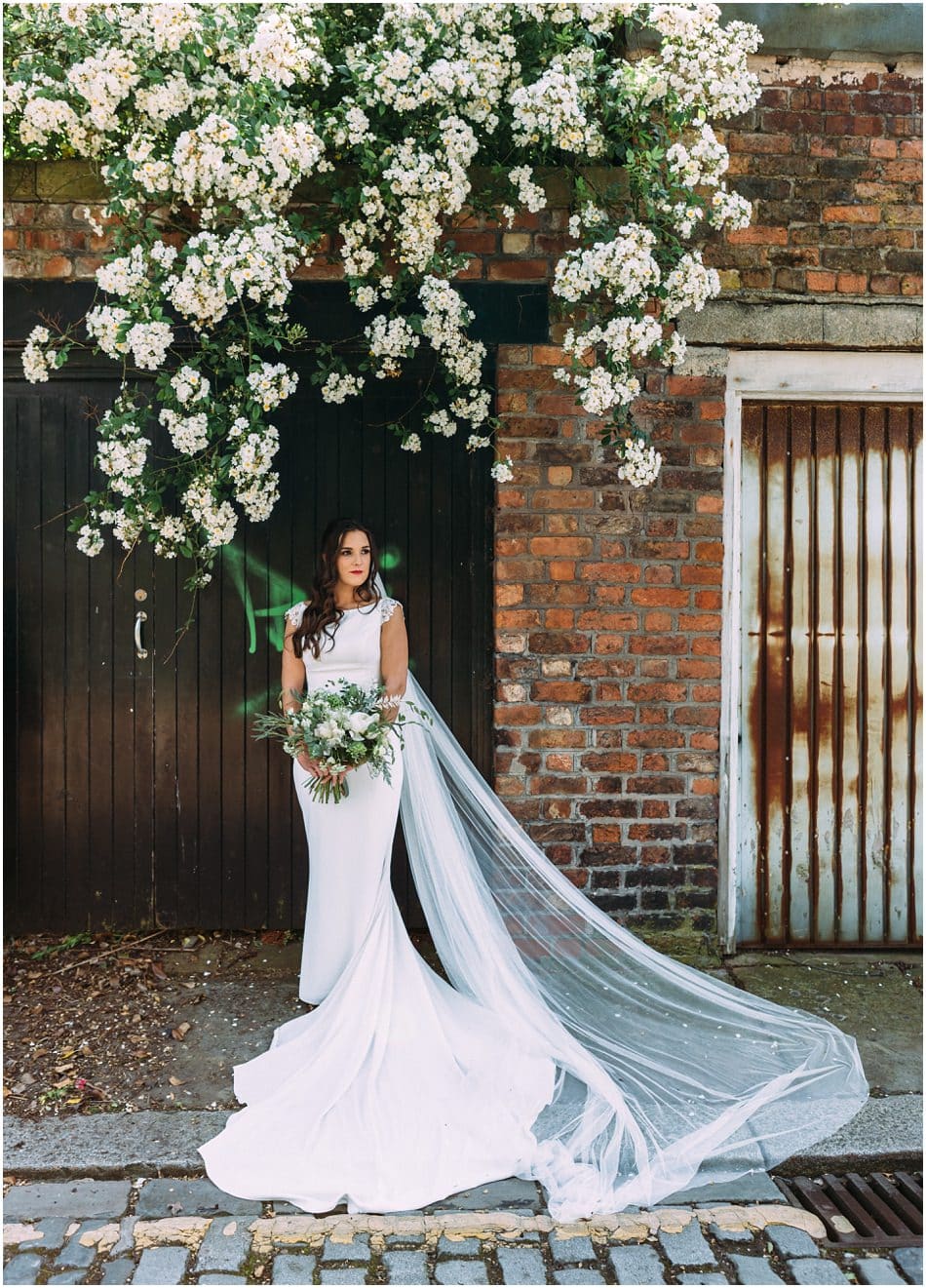 Siren Liverpool wedding photography; Bride with floor length veil