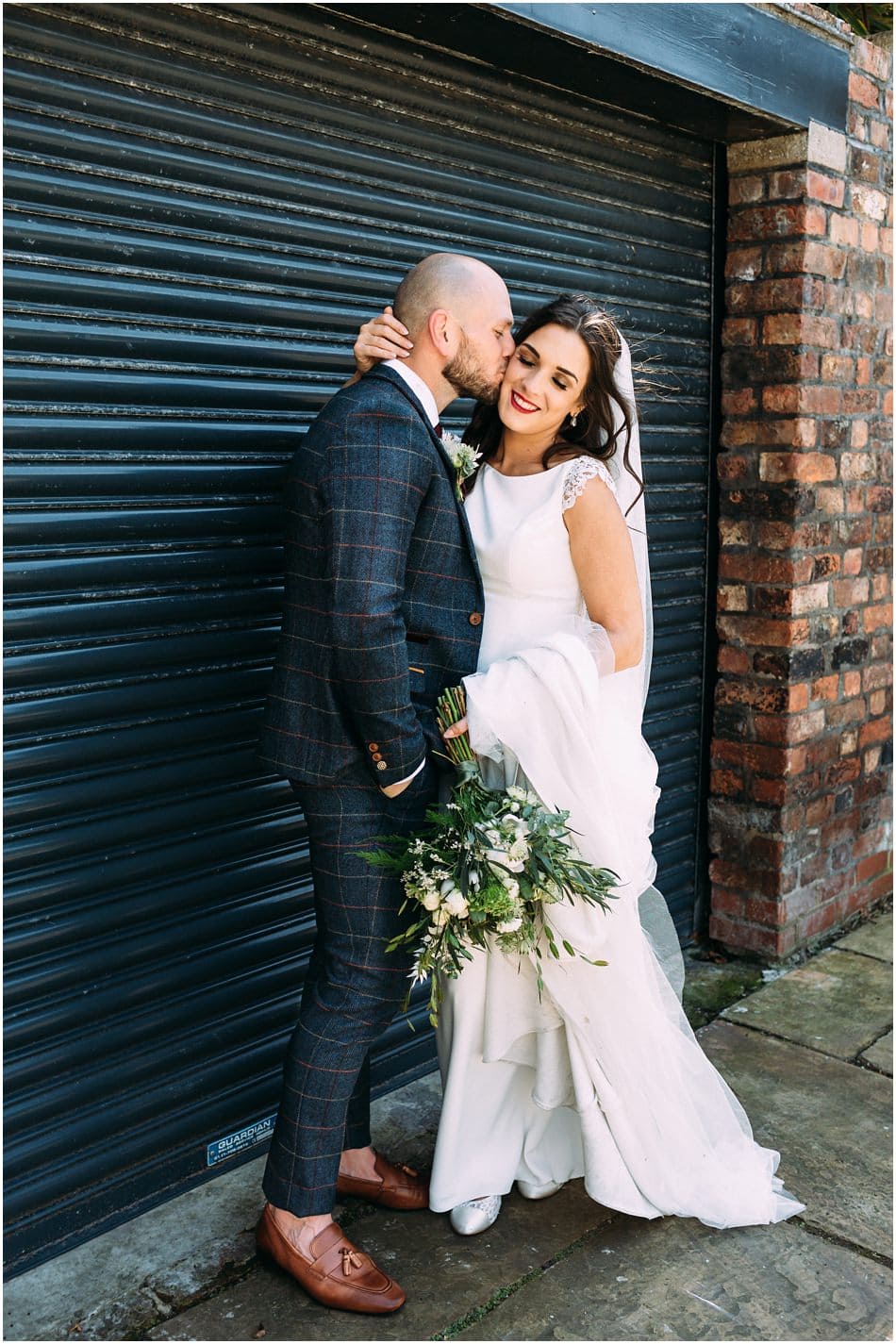 Alternative Hope Street Hotel wedding photography; Bride and Groom kiss 