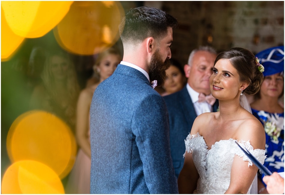 Shustoke Barn wedding photography; couple in a civil ceremony