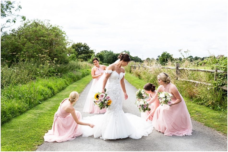 Shustoke Barn wedding photography; Bride with her Bridesmaids