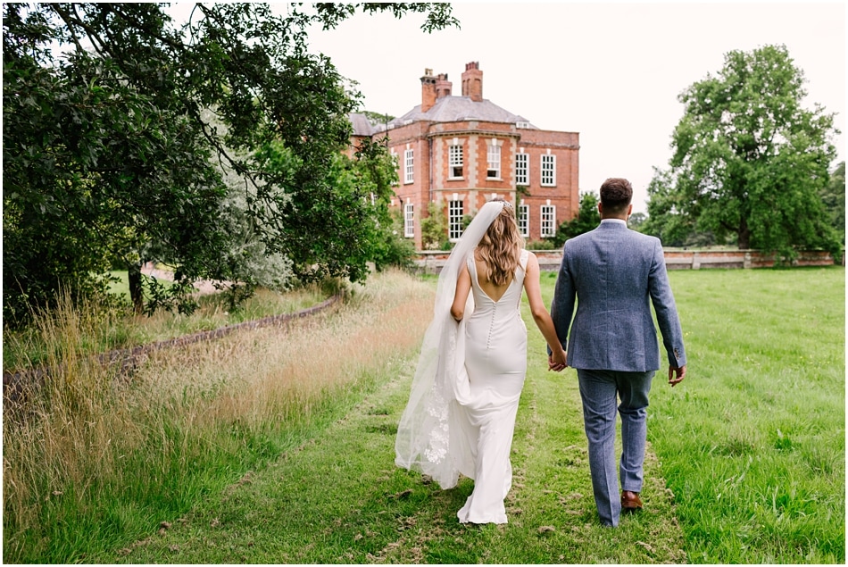 Couple walking back towards Iscoyd Park