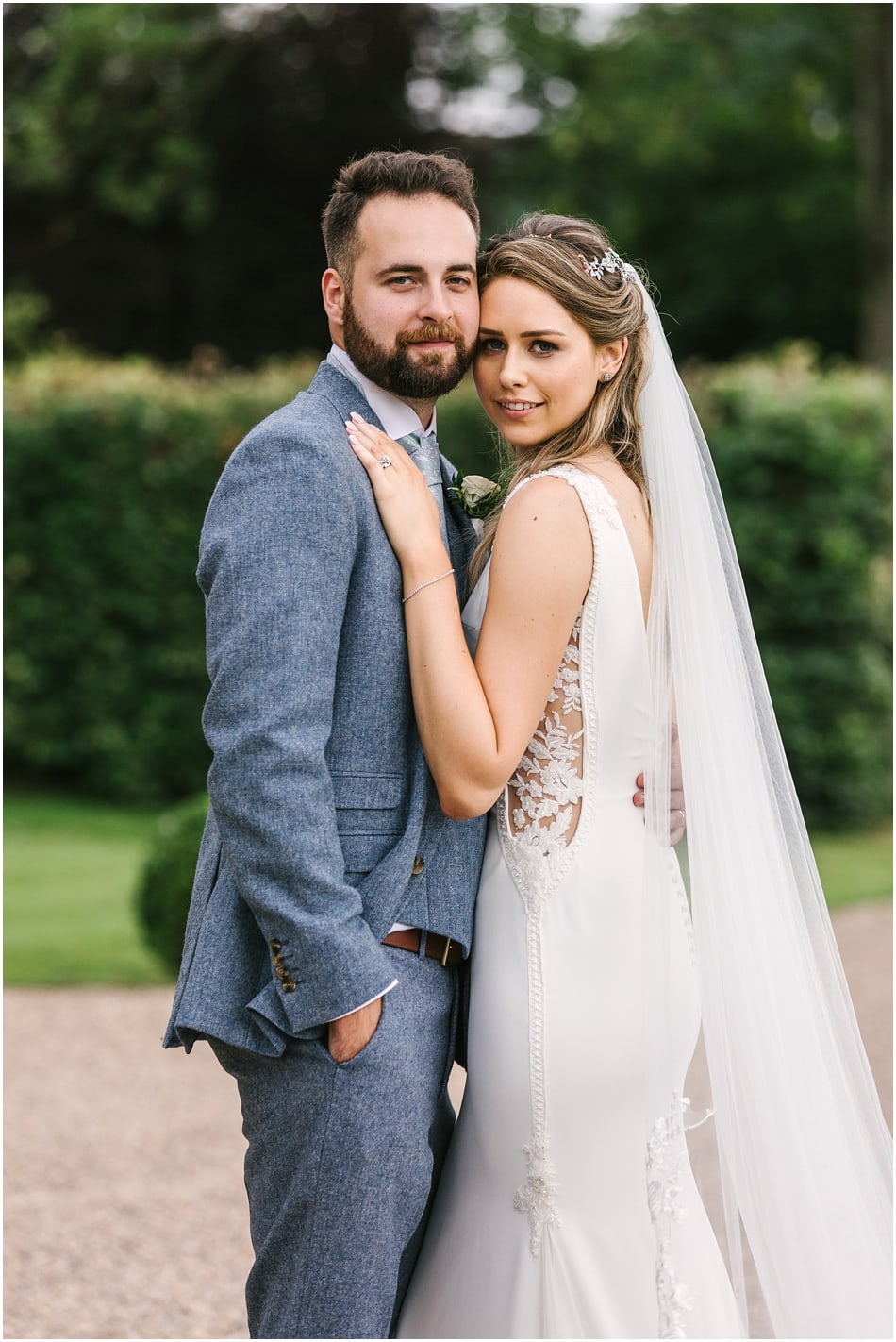 Iscoyd Park wedding photography - Bride and Groom portrait on the front driveway