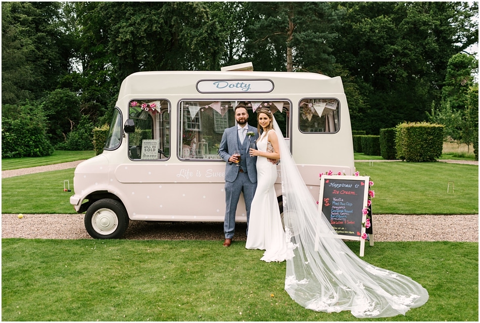 Pink vintage ice cream van with Bride and Groom at Iscoyd Park