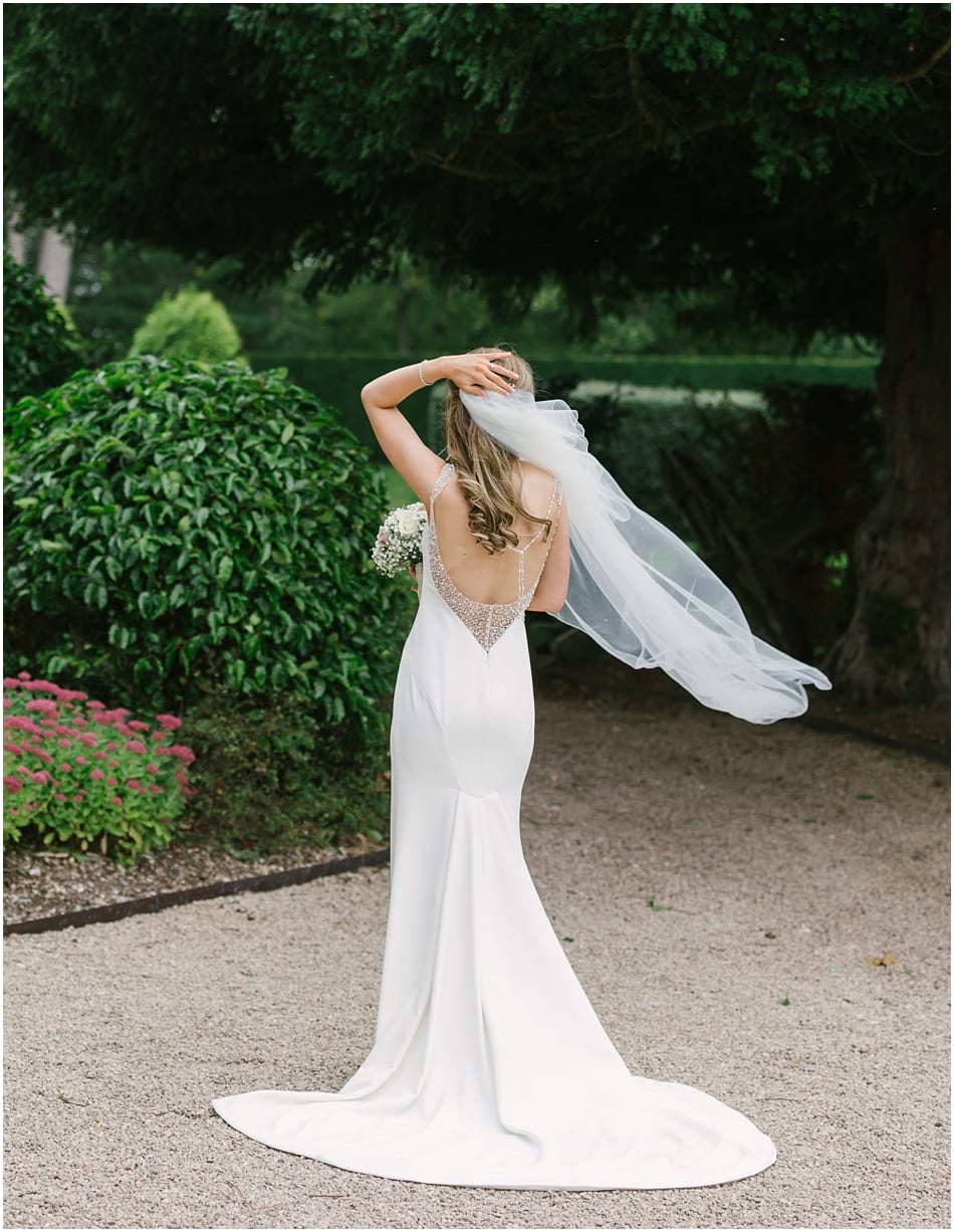 Bride with flyaway veil; Staffordshire wedding photographer