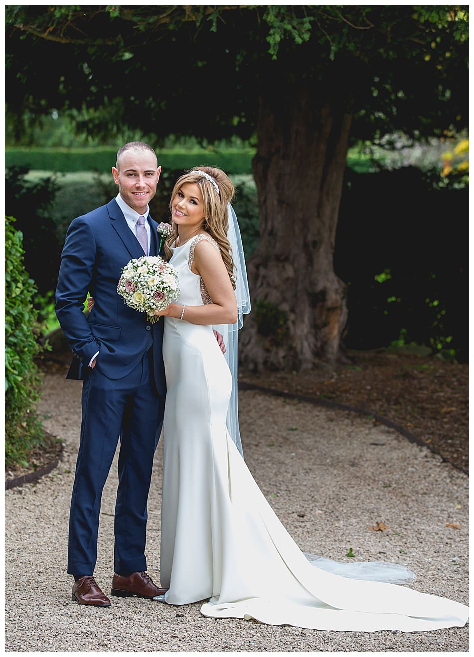 Bride and Groom in the gardens at their elegant Alrewas Hayes wedding