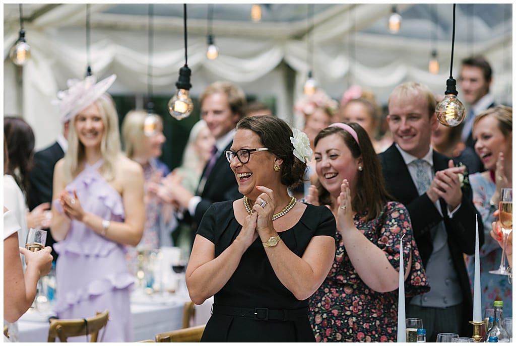 Speeches in a Woodland Marquee Reception with Eddison light bulbs