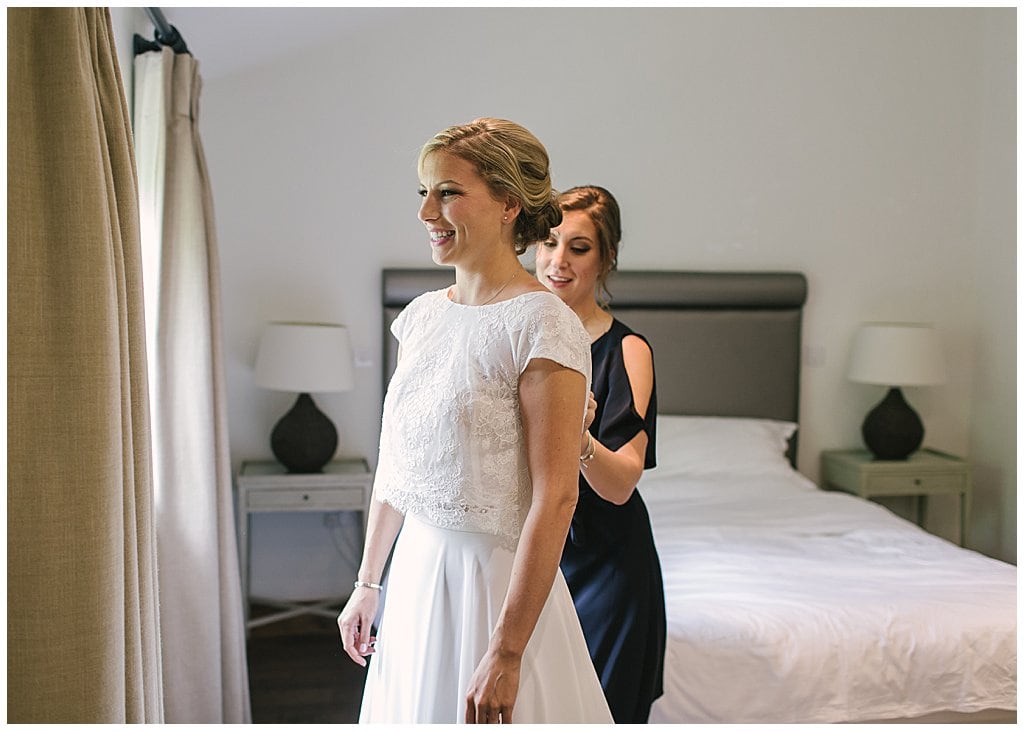 Bride getting ready at a small wedding at Eckington Manor