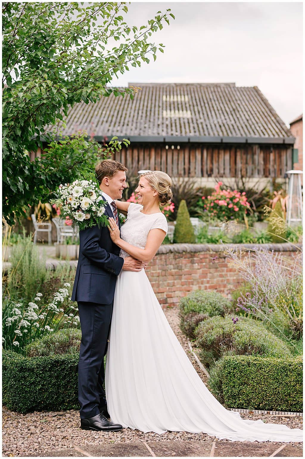 Couple portrait in gardens at a small and intimate wedding in Worcestershire 