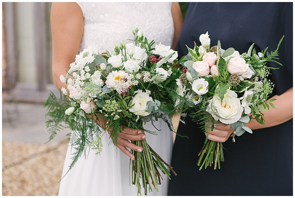 Beautiful white bridal bouquets at a small wedding