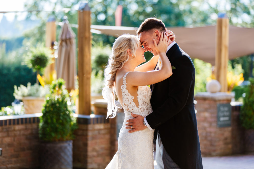 Nuthurst Grange wedding photography; bride in lace low back dress