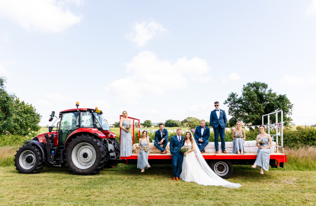 Bridal party group photo at young farmers wedding