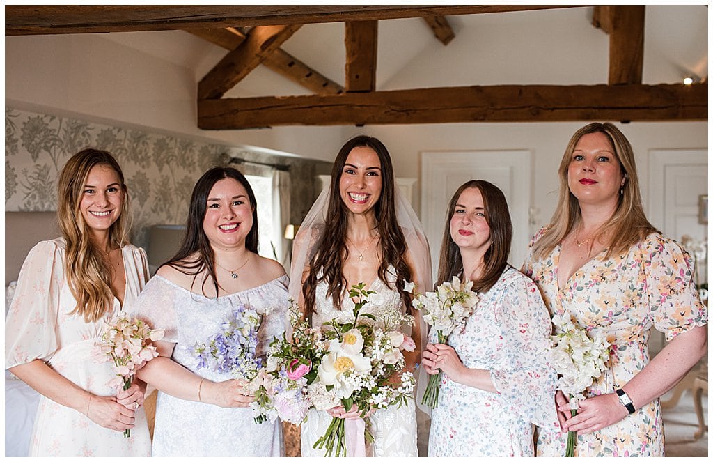 Smiling Bride with her Bridesmaids in the Alrewas Hayes Bridal Suite