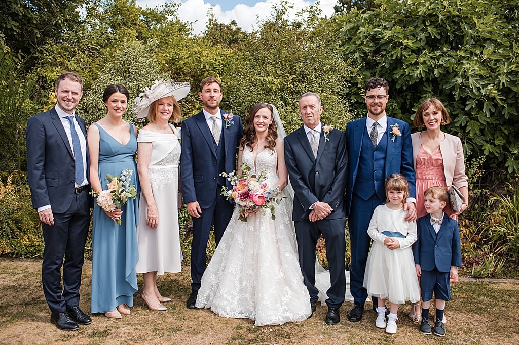 formal family group photo at a Curradine Barns wedding