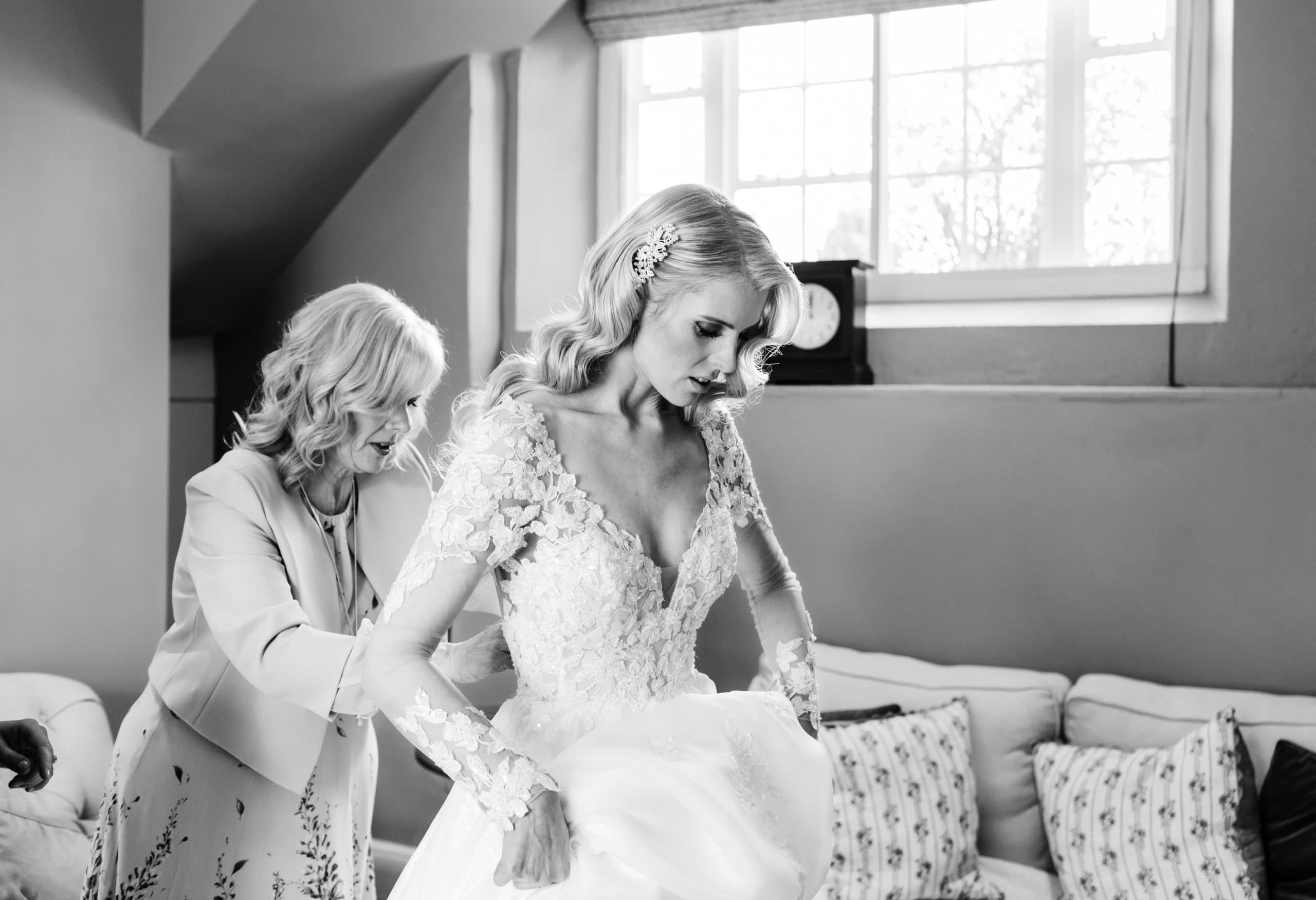 bride getting ready with her Mum in the tower suite at Rowton Castle