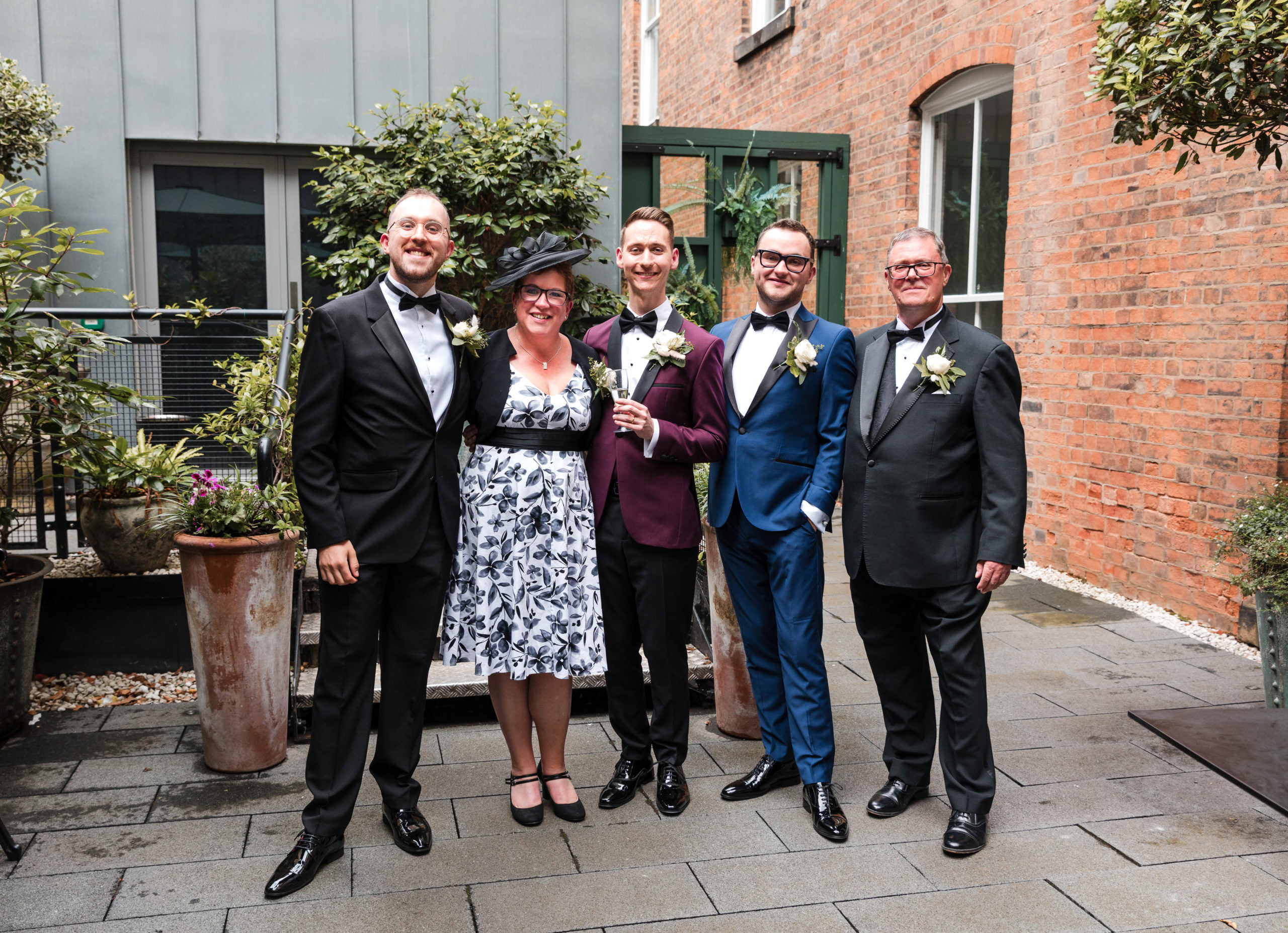 Family group photos on the outdoor terrace at wedding at The Grand Hotel in Birmingham