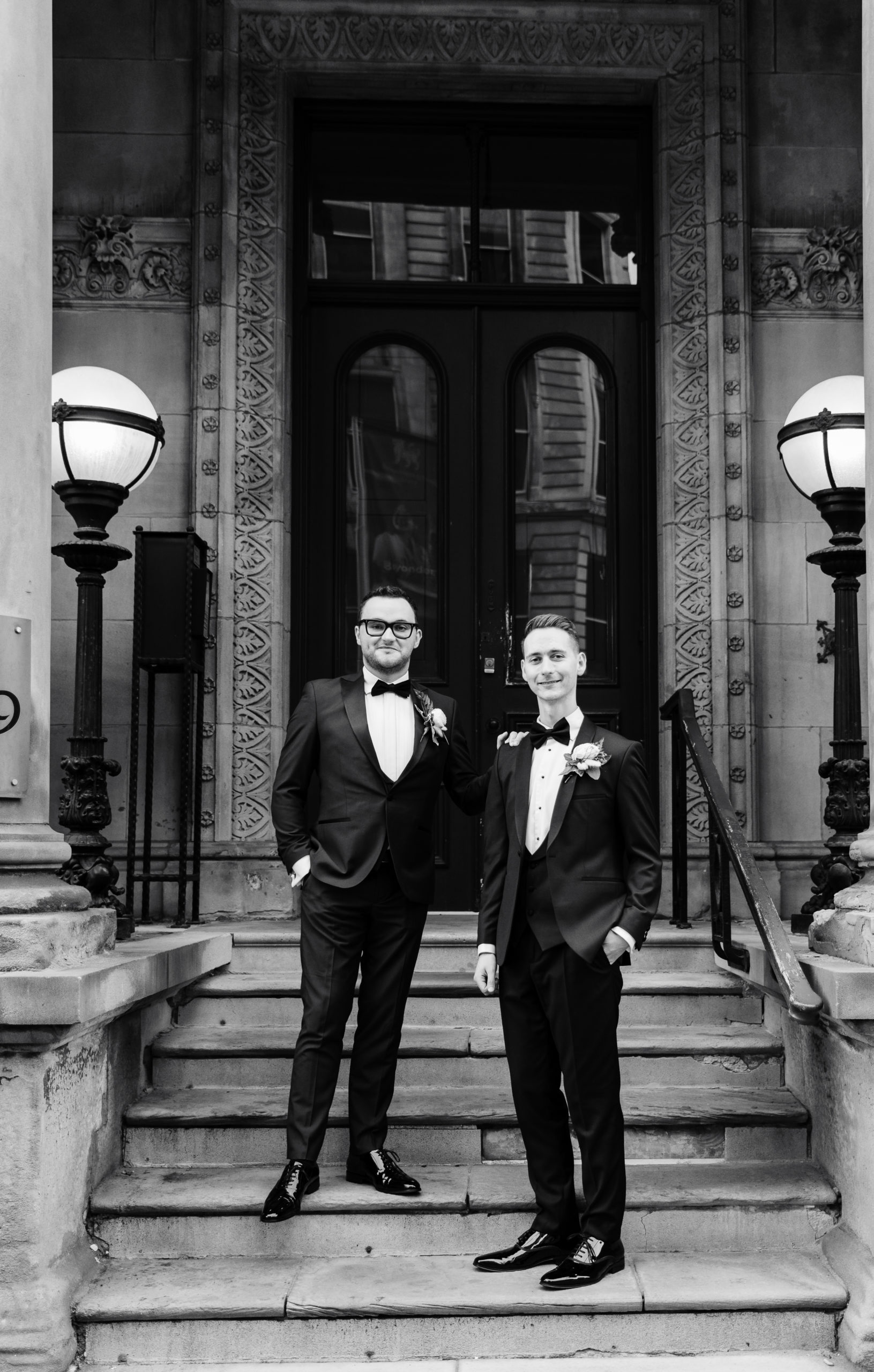 Same sex couple pose for photos after their gay wedding in Birmingham City Centre