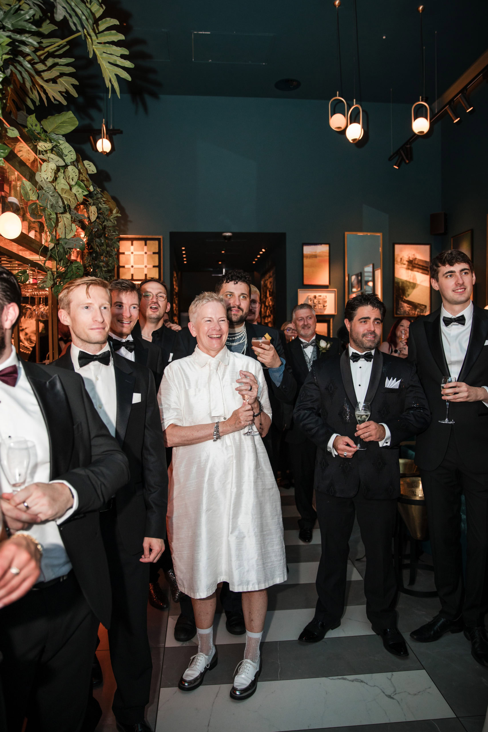 Candid natural wedding photography of guests at a cocktail party at Orelle in Birmingham