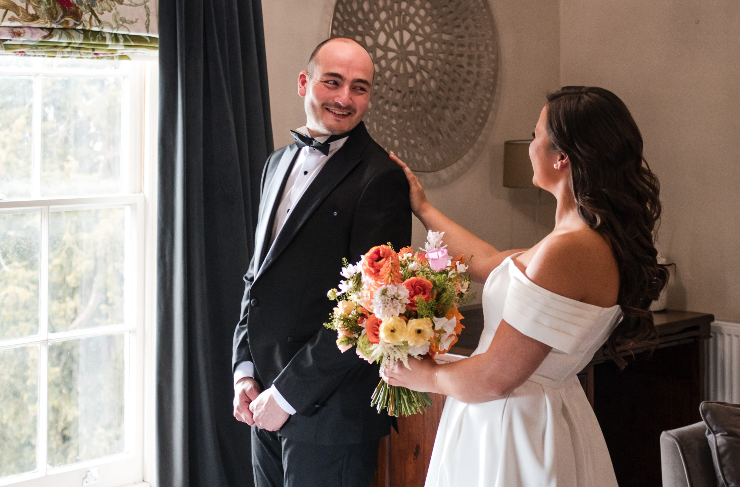 Bride and Groom share a first look before their wedding ceremony at St Johns House