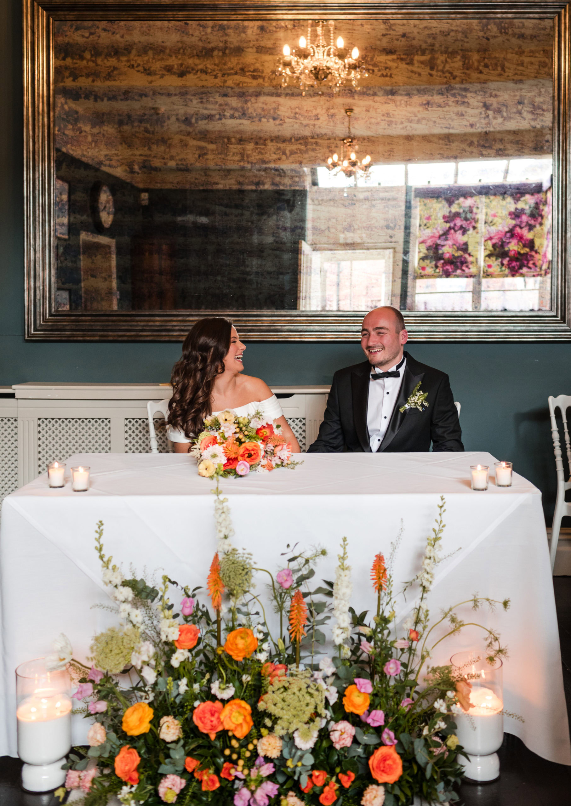 candid photography of Bride and Groom laughing after their wedding ceremony