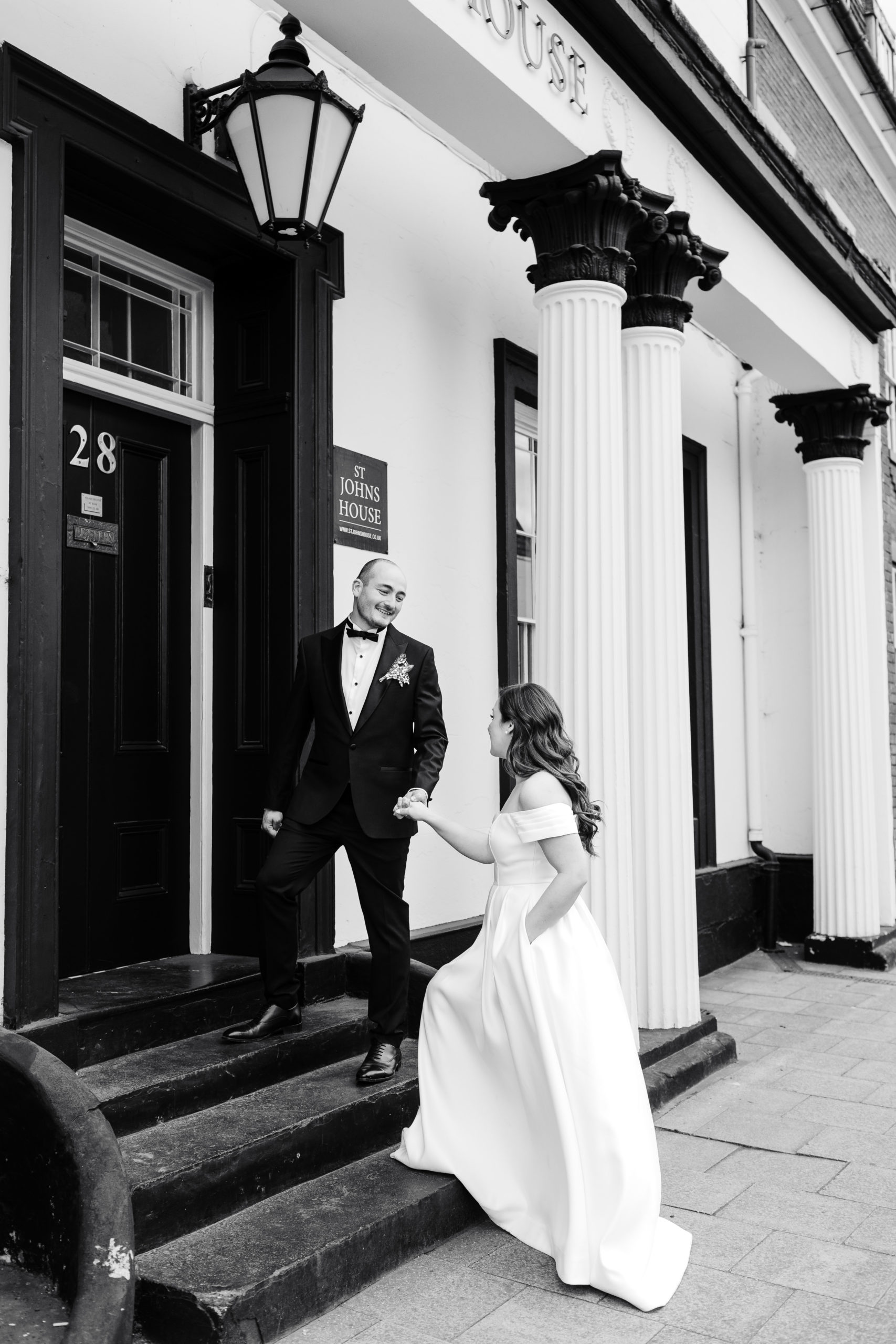 Bride and Groom outside St Johns House captured by a Lichfield wedding photographer during their intimate wedding day.